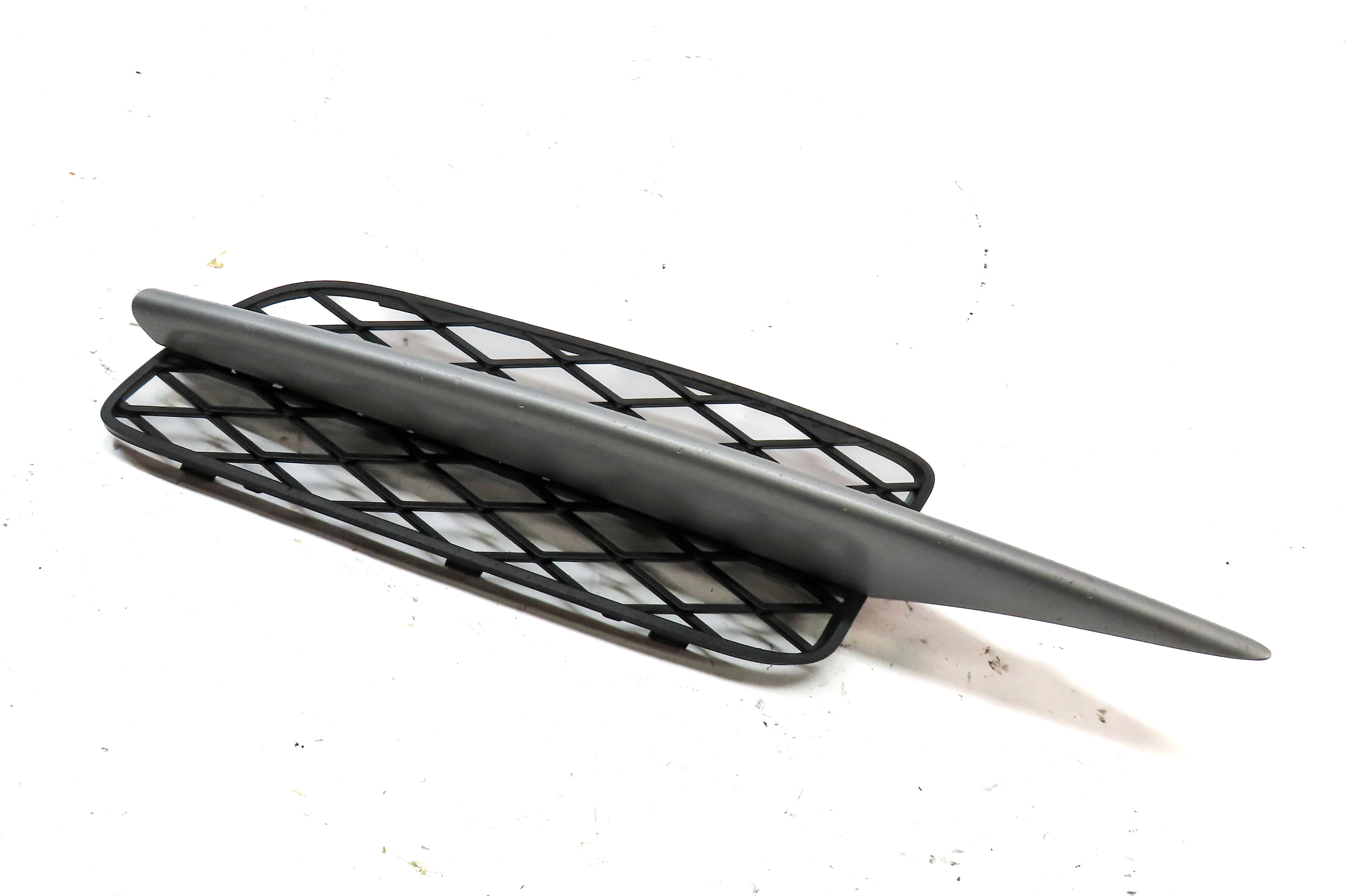 2007-2010 BMW X5 (E70) LEFT FRONT DRIVER LOWER BUMPER AIR VENT TRIM GRILLE END — exact item pictured